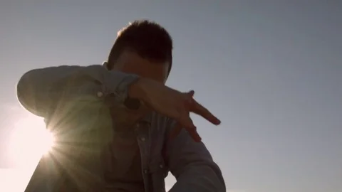 Man dancing in the city at dawn 스톡 동영상 79666003