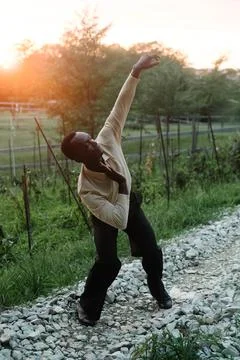 Man dancing on countryside Stock Photos