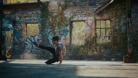 Man dancing in empty dusty building Video stock 117917579