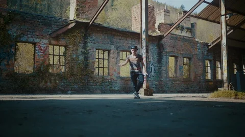 Man dancing in empty hall building Stock Footage 117917133