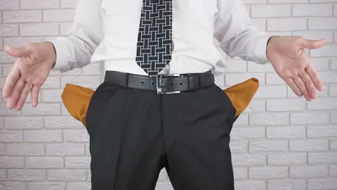 A man is dancing with empty pockets. Stock Footage 85650760