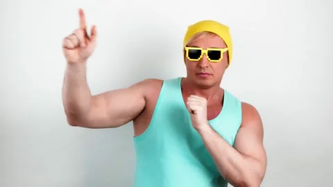Man dancing enjoying music. Guy excited dance, yellow beanie, blue tank top Vídeo Stock 235850566