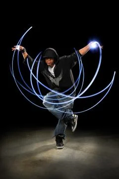 Man dancing with light painting Stock Photos