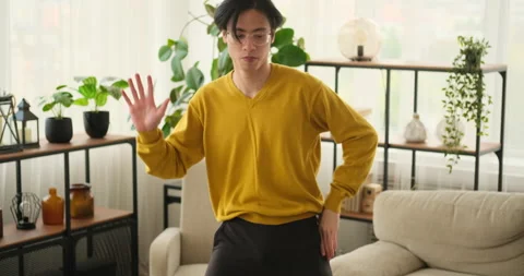 Man dancing in living room Stock Footage 145292841