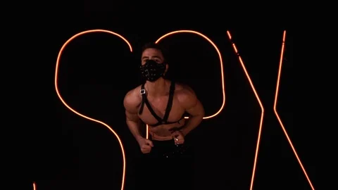 Man is dancing in mask Stock Footage 99139577