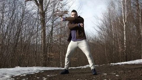 Man dancing in the mountains in spring season 스톡 동영상 82650271