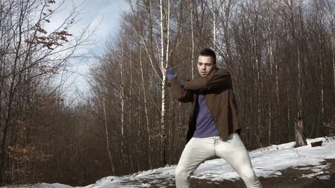 Man dancing in the mountains in spring season Video stock 82651464