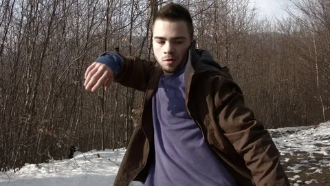Man dancing in the mountains in spring season Stock Footage 82660696