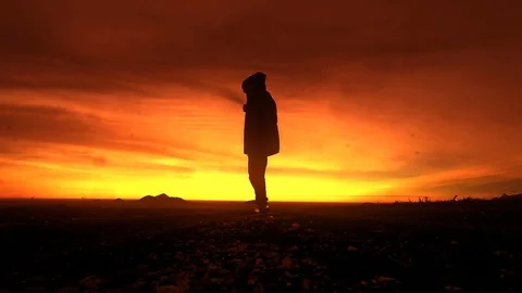 Man dancing in the mountains at sunset Stock Footage 102613901