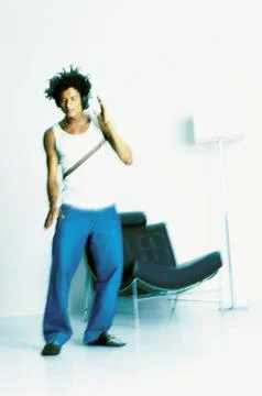 Man dancing to music Stock Photos