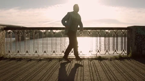 Man dancing near the river Stock Footage 79659782