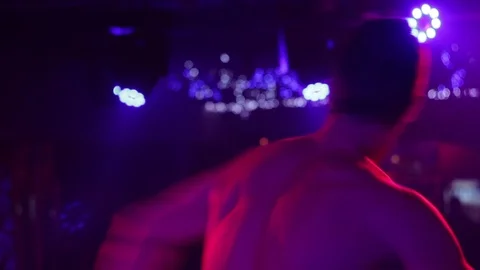 Man dancing in night club Stock Footage 76200503