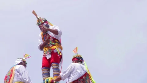 A man is dancing over a tower. Stock Footage 77374553