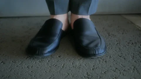 A man is dancing in the parking lot. Stock Footage 199686812