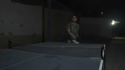 A man dancing before playing ping pong with a lot of self-confidence and losing 動画素材 170019540