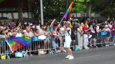 Man Dancing with Rainbow Flag at Madrid Pride Parade (MADO) 2026 in Madrid Vídeo Stock 339205329