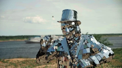 A man dancing in a shiny disco robot costume made of mirrors 스톡 동영상 119522633