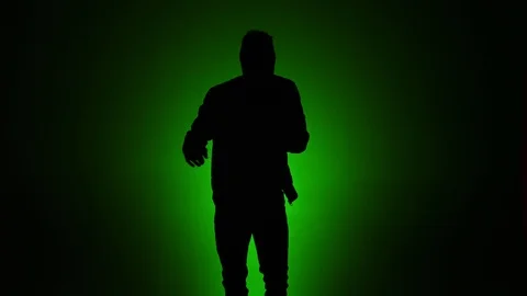 Man dancing silhouette green background 1 Stock Footage 90782677