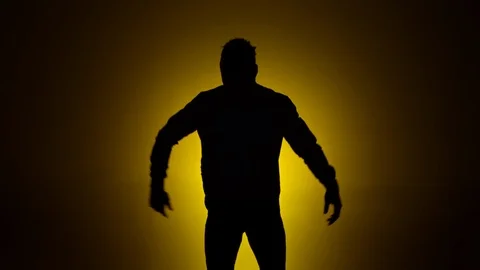 Man dancing silhouette yellow background 2 Stock Footage 90794528