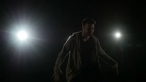 Man dancing on stage Stock Footage