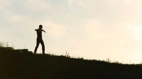 Man dancing at sunset Stock Footage 46072272