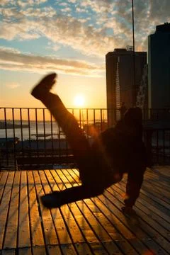 Man dancing on terrace Stock Photos