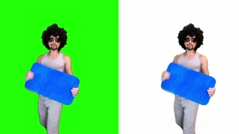 Man Dancing with Text Sign on Green Background 스톡 동영상 295160180