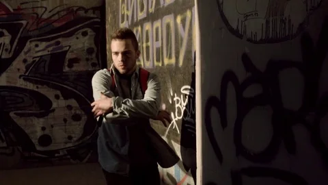 Man dancing in an underpass 스톡 동영상 79594339