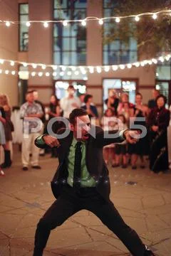 Man Dancing At Wedding Reception