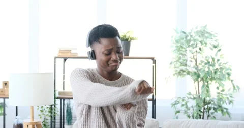Man dancing while listening music on headphones Stock Footage 196079616