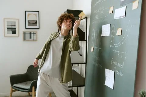 Man Dancing While Working on Business Strategy in Office Stock Photos