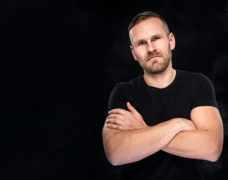 Man on a dark background. Stock Photos