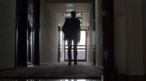 Man in a dark corridor Video stock 60123780
