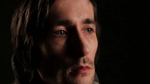 Man in dark room. Closeup Stock Footage 56725465