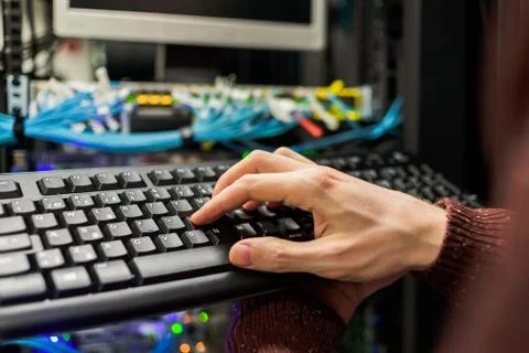 Man data center technician performing server maintenance Stock Photos