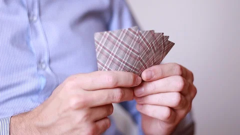 Man dealing playing cards 動画素材 93336682