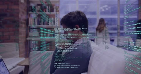Man debugging code at office laptop initiating green code overlay swirling Stock Footage 329864573