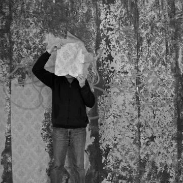 Man in decayed room Stock-Fotos