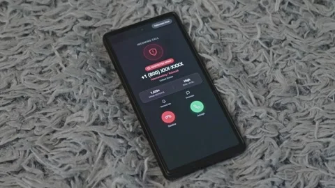 Man declines suspected spam incoming call on smartphone interface, illustration Stock Footage 341569441