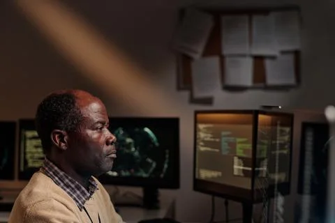 Man decoding online data on screen Stock Photos