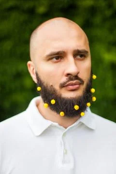 Man with decoration in beard 스톡 사진