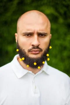 Man with decoration in beard 스톡 사진