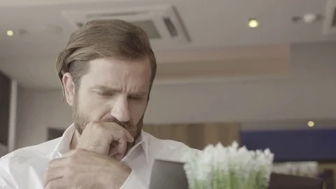 Man deep in thought with worried expression on face Video stock 75188252