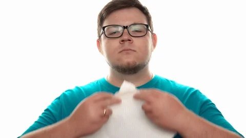 Man delicately eats a pear Stock Footage 112772286