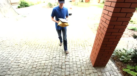 Man delivering a package and asking for a signature Stock-Footage 40739066