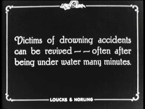 A man demonstrates the Prone Pressure Method, 1928, a technique used on drown Stock Footage 75331888