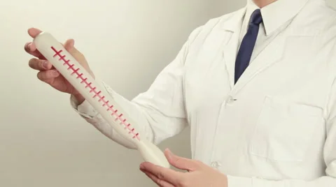 A Man Demonstrates Thermometer Stock Footage 62332183
