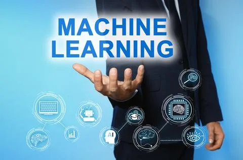 Man demonstrating machine learning model with linked icons on blue background Stock Photos