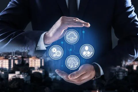 Man demonstrating machine learning model with different icons and night citys Stock Photos