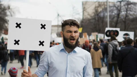 Man at a demonstration with banner with points for tracking to copy space text. Stock Footage 96023475